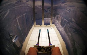 The walls of a toilet are decorated with a mountain panorama wallpaper and skis on the floor at the "Red Fox" restaurant in the winter sport resort of Rosa Khutor, a venue for the Sochi 2014 Winter Olympics near Sochi February 21, 2013. Although many complexes and venues in the Black Sea resort of Sochi mostly resemble building sites that are still under construction, there is nothing to suggest any concern over readiness. Construction will be completed by August 2013 according to organizers. The Sochi 2014 Winter Olympics opens on February 7, 2014. Picture taken February 21. REUTERS/Kai Pfaffenbach (RUSSIA - Tags: BUSINESS CONSTRUCTION CITYSCAPE ENVIRONMENT SPORT OLYMPICS TPX IMAGES OF THE DAY) ORG XMIT: KAI01